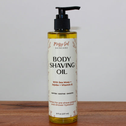 Mossy Gal Body Shaving Oil in clear cosmetic bottle.