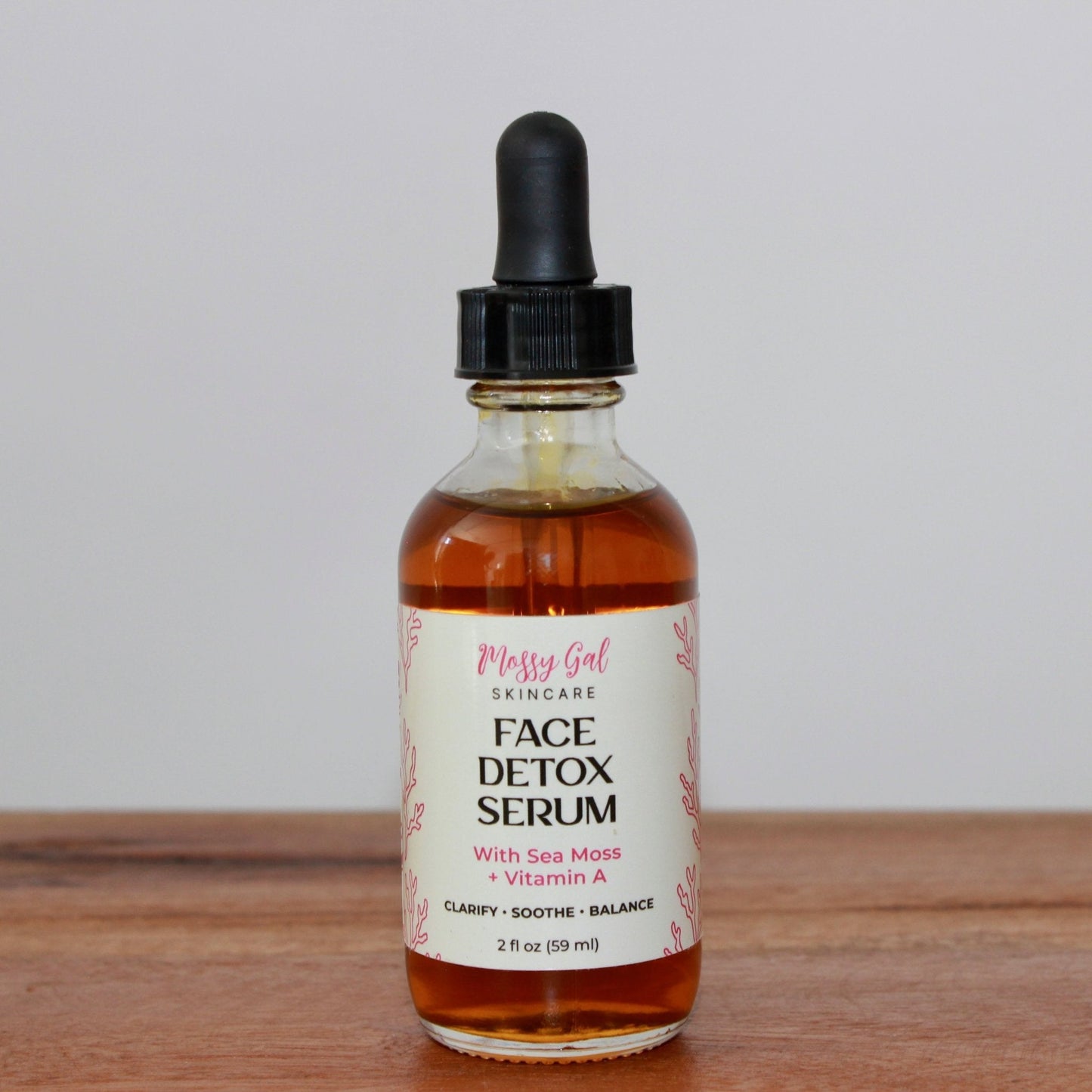 Mossy Gal Face Detox Serum in glass dropper bottle.