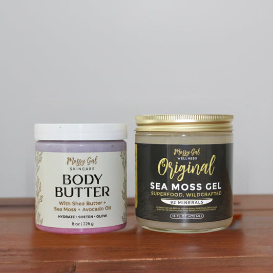 Mossy Gal glow routine kit featuring body butter and Original sea moss gel on a wooden surface