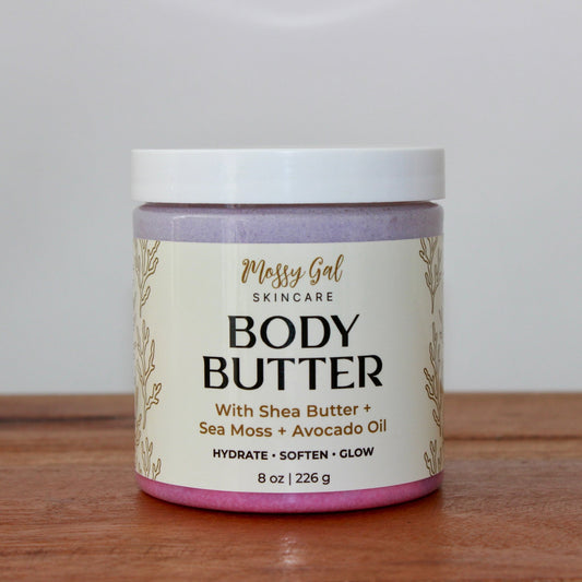 Mossy Gal Body Butter in wide cosmetic jar with lid.