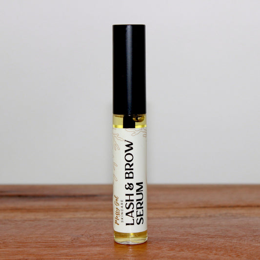Mossy Gal Lash and Brow Serum with natural applicator tube.
